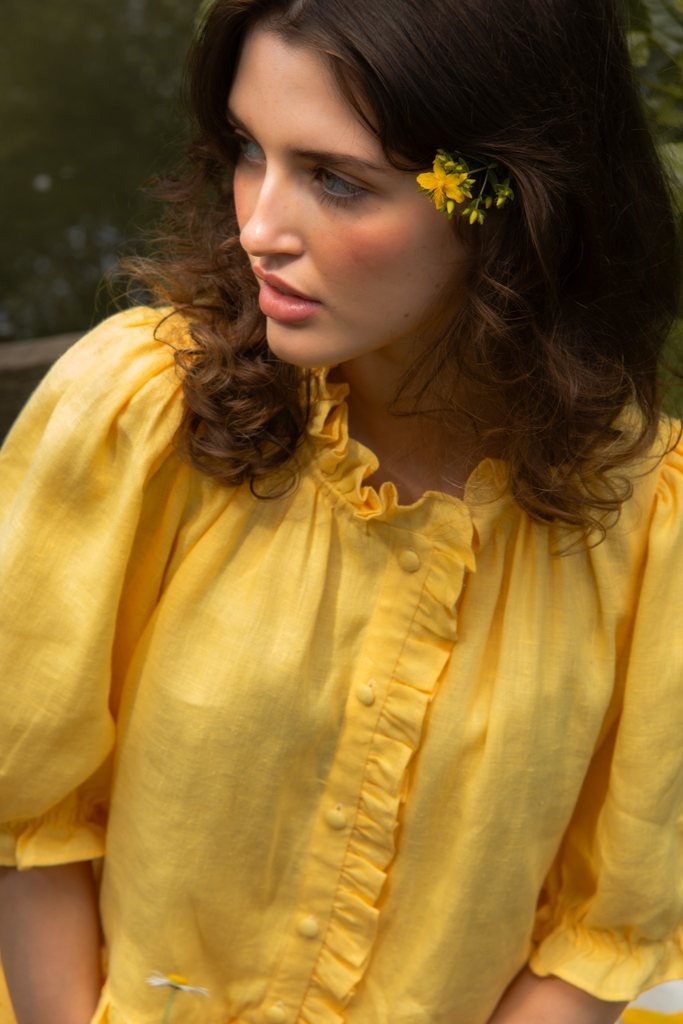 Editorial beauty portrait in yellow linen photographed in natural light by Lucy Rappolt