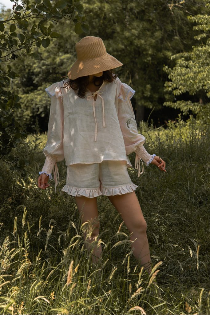 Natural light womenswear brand photograph in a summer meadow by London photographer Lucy Rappolt