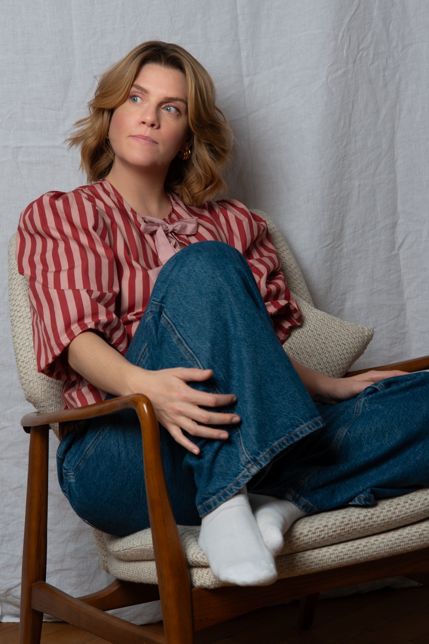 Colour editorial portrait in a vintage chair